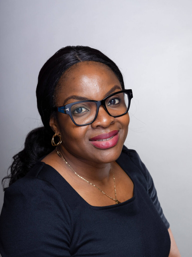 Home c.okereke headshot scaled e1700765157162 768x1024