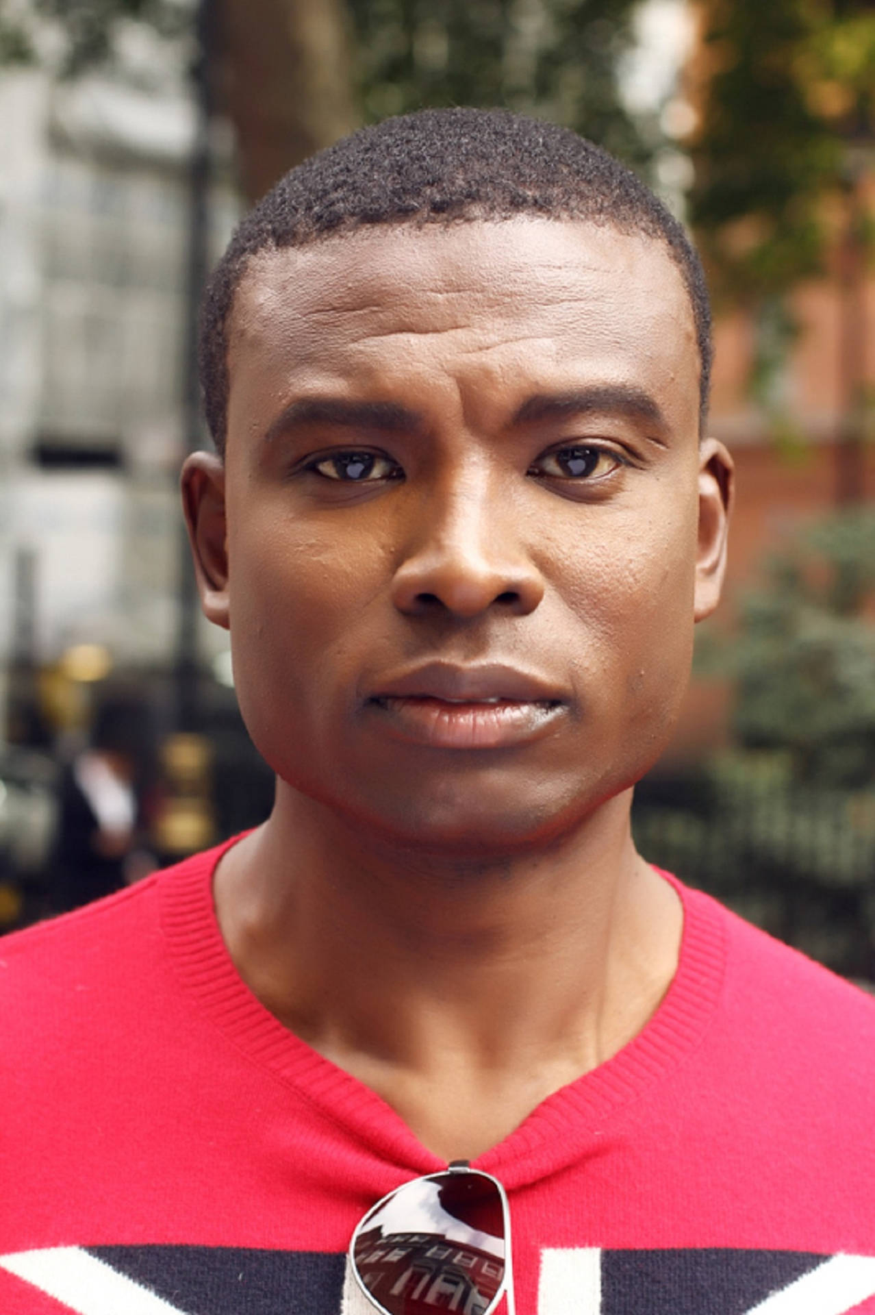 Home black man in red and on the street 858o6xzf8nk2lcas